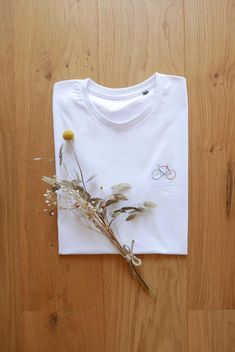 Customizable organic cotton t-shirt embroidered hand | Etsy Film Photography Tips, Embroidered Shirt, Needle And Thread, White T, Film Photography, Photography Tips, Cotton T Shirt, Hand Embroidered, Clothing Items