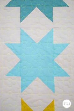 The Star Adventure Quilt pattern by Meghan of thencamejune.com. ​ ​Stuck on choosing a pantograph? ​ ​TCJ's faves are a click away. #thencamejunepatterns #thencamejune #quiltpantographs #longarmquilting #favepantos