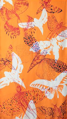 an orange and white butterfly print fabric