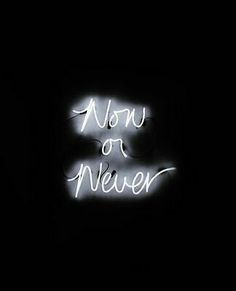 a neon sign that says now or never