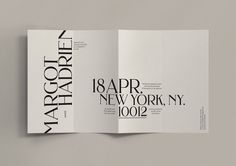 an open magazine with black and white typograms