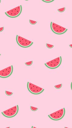 a pink background with watermelon slices on it