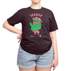 Vintage-washed, garment-dyed tee in a unisex style. Made from 100% ringspun cotton sourced from American farms. Shoulder-to-shoulder tape for durability. Ribbed set-in collar lays flat. Available in sizes S–3XL. Cute T Rex, Pink Cowboy Hat, Cartoon Frog, Pullover Windbreaker, Zip Up Hoodies, Cowboy Hat, Cut Shirts, Unisex Style, Baby Tshirts