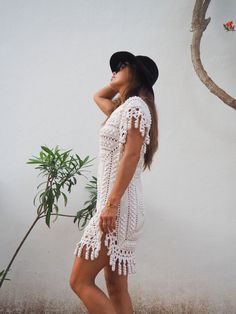 Vintage white 1960’s handmade detailed crochet lace dress up-cycled by Vagabond Ibiza. We hand source antique and vintage crochet & lace textiles and up-cycle it here in Ibiza in to unique on off a kind garment just for you. Due to the nature there could be some imperfections but we do our best to only recycle mint condition textiles. Size is small Condition is perfect Bohemian Beach Cover-up Dress With Crochet Trim, Bohemian Handmade Lace Dresses, Lace Crochet Dress With Crochet Trim As Beach Cover-up, Handmade Bohemian Lace Dresses, Fitted Bohemian Lace Dress For Beach, Bohemian Lace Crochet Dress With Crochet Trim, Bohemian Lace Crochet Trim Dress, Bohemian Lace Dress With Crochet Details, Fitted Bohemian Crochet Dress With Lace Trim