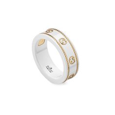 Style ‎606826 J85V5 8062The Icon collection reprises one of the House's most emblematic motifs for Cruise 2020. The Interlocking G, presented in yellow gold, contrasts against a white zirconia band. A braided trim completes the style.18k yellow gold and white zirconiaInterlocking G.3" bandSize: 6.50Made in Italy Gucci Accessories Jewelry, G Ring, Chic Rings, Versace Jewelry, Gucci Jewelry, Zodiac Jewelry, Luxury Rings, Ladies Diamond Rings, Expensive Jewelry