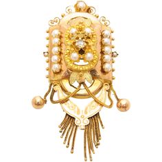 This is an antique 19th century gold ornate pendant and brooch created with seed pearls and lovely tassels. The design of this piece is magnificent, set with a double C-shape, leaf motifs and beading made of 14 karat yellow gold and rose gold. The pendant is created with four seed pearls and a glass stone in the center. The sides of the pendant are adorned with ten lustrous seed pearls, while the top has a curled frame wirework with a centered pearl. Below the top thirteen tassels swing freely a Victorian Pendant Necklace, Art Deco Pendant Necklace, Gold Starburst, Victorian Pendants, Art Deco Pendant, Antique Pendant, Gold Locket, Art Deco Necklace, Floral Pendant