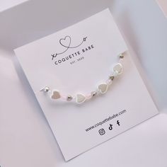 Handmade By Me One Size Stretchable White Heart Charm Bracelet For Everyday, White Heart Charm Bracelet As A Gift, White Heart Charm Bracelet As Gift, Personalized White Heart Bracelet For Everyday Wear, Adjustable White Heart-shaped Jewelry, Personalized White Heart Bracelet For Everyday, Dainty White Heart Bracelet As A Gift, Dainty White Heart Bracelet As Gift, Dainty Personalized White Heart Bracelet