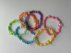 rainbow set of 6 small handmade beaded bracelets for kids, toddlers with a heart bead on each Beaded Bracelets For Kids, Dance Shirts Ideas, Bracelets For Kids, Handmade Beaded Bracelets, Dance Shirts, Bracelets Handmade Beaded, Heart Beads, Bracelet Set, Beaded Bracelet