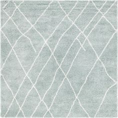 a light blue rug with white lines on it