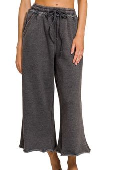 Upgrade your comfort and style with our Acid Wash Fleece Palazzo Sweatpants. Featuring an ash black acid wash design, these sweatpants are not only trendy, but also have a drawstring waistband and pockets for practicality. Made with a cotton-polyester blend for ultimate softness, you'll never want to take them off. Made by Zenana in Cambodia. Pockets - Raw Hem Inseam: 23.5" Approx. - Fabric 60% Cotton 40% Polyester Short Sleeve Kimono, Sweatpants With Pockets, Fleece Leggings, Fleece Sweatpants, Black High Waist, Cropped Sweatshirt, Loungewear Set, Woven Top, Hot Outfits