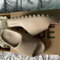 (Brand New) Authentic Yeezy Slides (Restocked) Color: Pure Size: (Us) 4y/4m (Fits Like A 5 Or 5.5 Women’s) New With Tags & Original Box Comes With Proof Of Authenticity Purchase W/Fendi Bag Or Dior Sneakers At Original Price And Get $125 Off ***No Offers-Price Is Firm*** Tan Yeezy Slides, Yeezy Slides Pure, Adidas Yeezy Slides, Dhgate Finds, Adidas Shoes Yeezy, Yeezy Slides, Dior Sneakers, Fendi Bag, Shoe Wishlist