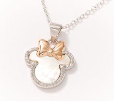 Disney fans, it's your time to dazzle! Featuring the forever-favorite mouse silhouette, this sterling silver Minnie necklace gets its glow from a mother-of-pearl pendant with Diamonique simulated diamonds and a rosy bow to complete the cute design. Minnie Mouse Beaded Necklace, Mouse Silhouette, Mother Of Pearl Necklace, Cute Design, Pearl Pendant, Cute Designs, Mother Of Pearl, Minnie Mouse