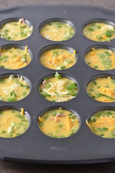 a muffin tin filled with lots of different types of food