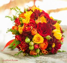 a bouquet of flowers sitting on top of a table