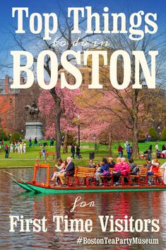 a boat filled with people on top of a lake next to trees and buildings in the background