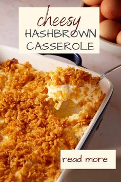 a casserole dish with cheese and hashbrown crumbs in it