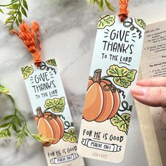 two bookmarks that say give thanks to the lord and for he is good