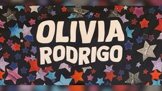 an image of a sign that says ollivia rodrigoo with stars all over it