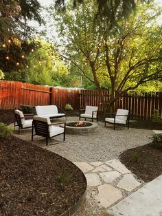 an image of a patio with chairs and fire pit in the back yard, on instagram