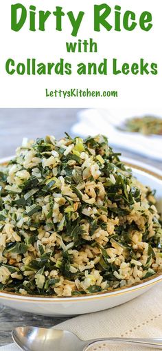 a white bowl filled with rice and greens on top of a table next to silverware