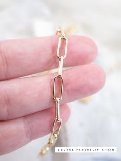 Details: - 18K Gold Filled Curb Cuban chain. Link size: approx. 5mm - 18K Gold Filled Rope Paperclip chain. Link size: approx. 10mm x 6mm - 18k Gold Filled Square Paperclip chain. Link size: approx. 10m x 4mm - 24K Yellow Gold Filled Round Link Chain. Link size: approx. 7mm - 100% hypoallergenic, Lead & Nickel Free. Product care: - You can shower with it however you should avoid saltwater/ swimming pool/ jacuzzi. - Avoid the jewelry coming into contact with perfume or lotions. - Store away i Gold Link Paperclip Bracelet As Gift, Gold Paperclip Chain Bracelet With Adjustable Chain, Gold Link Paperclip Chain Bracelet, Gold Paperclip Chain Bracelet Gift, Gold Plated Link Paperclip Bracelet With Adjustable Chain, Gold Minimalist Chain Necklace With Solid Link, Yellow Gold Chain Necklace With Solid Link Construction, Gold Link Chain Bracelet With Paperclip Design, Gold Link Chain Bracelet With Paperclip Style