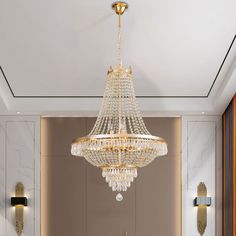 a chandelier hanging from the ceiling in a room