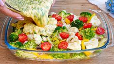 broccoli, cauliflower and tomatoes are being mixed together in a glass dish