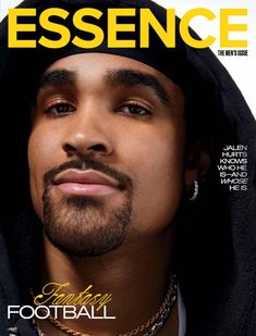 a man in a hoodie is featured on the cover of an issue of essence magazine