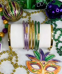 Step into the vibrant spirit of the French Quarter with our French Quarter Bracelet Set – a dazzling and festive addition to your collection of Mardi Gras accessories. This set includes six bracelets in classic Mardi Gras colors: gold, purple, and green, capturing the essence of the lively festivities.
Perfect for accessorizing your Mardi Gras outfit, this bracelet set adds a touch of flair and style to your celebration. The combination of colors reflects the vibrant atmosphere of the Fren Mardi Gras Colors, Mardi Gras Outfits, The French Quarter, Good Times Roll, French Quarter, Purple And Green, Purple Gold, Mardi Gras, Bracelet Set