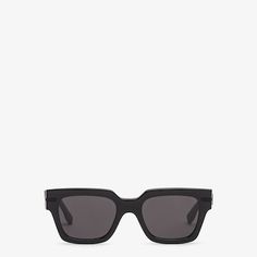 Rectangular Fendigraphy glasses in black acetate. Wide temples with black metal Fendi lettering. Dark grey lenses. Made in Italy. One Size Green Linen Trousers, Fabric Sandals, Gray Lenses, Light Backpack, Acetate Sunglasses, Color Ring, Grey Lenses, Nylon Bag, Ankle Bracelets