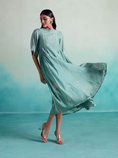 Introducing the enchantmint dress: embrace elegance and grace with this soft, lightweight chanderi dress in a refreshing mint color. Hand-embroidered with intricate motifs inspired by kutichi embroidery, this dress exudes a charming allure. Its flowy and dramatic design, complemented by pleats on the side, guarantees a show-stopping entrance at any gathering. Perfectly suited for get-togethers with loved ones, where delectable food and cherished family moments await. Step into enchantment with t Chanderi Dress, Family Moments, Mint Color, Xl Dress, Mint Green, Hand Embroidered, Entrance, First Love, Mint