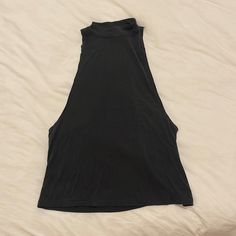 Nwt Silence + Noise Muscle Tee With Long Underarms In Black/Noir. You Would Likely Need To Wear A Cute Bra Or Bralette Underneath. Purchased From Urban Outfitters For $34. Last Pic Is An Attempt At A Side Angle Of The Shirt. Black Stretch High Neck Tank Top, Black High Neck Tank Top For Night Out, Fitted Black Tank Top T-shirt, Black Stretch High Neck Crop Top, Black High Neck Casual Tank Top, Black Crop Top For A Night Out, Casual High Neck Black Tank Top, Casual Black High Neck Tank Top, Black Fitted Sleeveless T-shirt