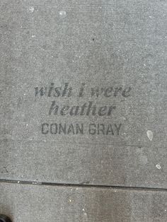 a sidewalk with writing on it that says, wish i were weather conn gray