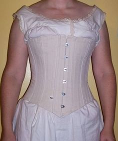 "Civil War Era Formal Corset made with Coutil Fabric. Your choice of either white or black fabric. This custom made corset is constructed of two layers pre-washed cotton coutil fabric. The seams in the outer layer have been felled for increased strength. The front with a busk closure. It laces up the back through metal grommets The two ties meet at the waist. It has 16 flat metal bones sewn into the corset between the layers. The white fabric will have silver busk and grommets; the black fabric Fitted Bodice For Larp, Fitted White Corset For Costume, White Fitted Costume Corset, White Corset Dress With Boned Bodice For Costume, White Boned Bodice Corset Dress For Costume, White Fitted Bodice Corset For Costume, White Historical Design Corset For Wedding, White Underbust Gothic Corset, Historical Design White Wedding Corset