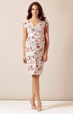 Our stylish floral print maternity dress is made from super soft premium French jersey in a delicious creamy shade that works beautifully with a fashionable nude palette. With a gently gathered crossover neckline and a knee length skirt with a hint of stretch, our Bardot dress fits to flatter. Sprinkled with a divine Japanese cherry blossom print in striking black and red bringing simple, refined elegance to your maternity partywear. Floral print Soft cream jersey Crossover neckline Elegant Nursing Friendly V-neck Dress, Elegant Summer Maternity Dress With Ruched Details, Elegant Ruched Maternity Dress For Summer, Elegant Spring Nursing Friendly Dresses, Elegant Spring Dresses Nursing Friendly, Fitted V-neck Maternity Dress With Floral Print, Maternity Dress With Surplice Neckline, Feminine Fitted Maternity Dress, Elegant Ruched Maternity Dress For Spring