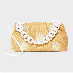 Step Out This Summer In Style With The Girls' Straw Daisy Crossbody Bag From Art Class In Off-White. This Adorable Accessory Features A Woven Straw Design With Delightful Daisy Accents. The Adjustable Shoulder Strap, Made From Durable Acrylic Chain, Ensures A Comfortable Fit For All-Day Wear, While The Magnetic Closure Keeps The Belongings Secure. Perfect For Carrying Essentials Like Lip Balm, Sunglasses, And A Small Wallet, This Bag Is Both Stylish And Practical. Art Class'': One-Of-A-Kind Look Straw Design, Kids Art Class, Best Handbags, Straw Bags, Off White Color, Small Wallet, Art Class, Art Classes, Magnetic Closure