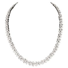 An elegant and timeless design. 30.95 carats of white pear, marquise and round brilliant cut diamonds set in platinum. 16 inch length. Wreath Necklace, The Bling Ring, Expensive Jewelry, Large Gift, Modern Necklaces, Bling Rings, Link Necklace, Round Brilliant Cut Diamond, Brilliant Cut Diamond