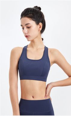 The Emes Shop sports bra is detailed with a round scoop neckline. thick bands. and elevated seaming. Features a triangular shaped mesh paneling in the back for both breathability and style. MATERIAL: 80% Nylon. 20% SpandexMEASUREMENTS: Small Bust: 24.8" in Length: 11.8"in Medium Bust: 26.4" in Length: 12.2"in Large Bust: 28" in Length: 12.6"in X-Large Bust: 28.3" in Length: 13"in Sports Activewear With Built-in Padding And Wide Straps, Stretch T-back Sports Bra With Built-in Padding, Scoop Neck Sports Bra With Built-in Bra For Training, Nylon T-back Sports Bra For Yoga, Athleisure Sports Bra With Built-in Padding And Wide Straps, High Stretch Racerback Sports Bra With Medium Support, Nylon Sports Bra With Built-in Padding For Light Exercise, Medium Support Scoop Neck Sports Bra In Athleisure Style, Functional Compressive Sports Bra With Mesh Back