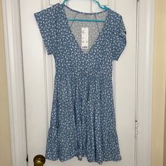 Urban Outfitters, Size Xs, Never Worn, Tags Still On Blue V-neck Sundress Mini Dress, Blue Short Sleeve Sundress For The Beach, Casual Blue Short Sleeve Dresses, Light Blue Casual Short Sleeve Dress, Blue Short Sleeve Sundress For Beach, Casual V-neck Dress With Ditsy Floral Print, Light Blue Ditsy Floral Summer Dress, Blue Casual Mini Dress With Short Sleeves, Casual Blue Mini Dress For Summer