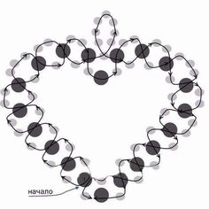 a heart made out of black and white circles