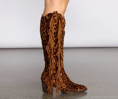 Yee-haw it's time to boot scoot n' boogey in these festival ready fringe boots babayy! Knee high fit Pointed toe Leopard print pattern Cowboy design Padded lining Inner zipper closure Faux Suede Please be advised this style runs 1/2 big. Western Boots With Tassels For Fall, Western Style Boots With Tassels For Fall, Western Fringe Boots For Fall, Brown Fringe Winter Boots, Fall Tassel Boots With Round Toe, Trendy Boots With Tassels For Fall, Trendy Spring Boots With Tassels, Trendy Festival Boots For Fall, Trendy Fall Festival Boots