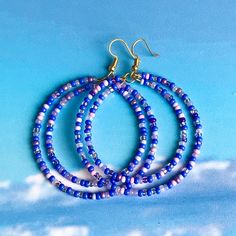 "Welcome to Oceana by Maureen on Etsy.  Periwinkle lavender blue mix, Boho double beaded hoop earrings as shown;  2.3\" diameter; Czech glass seed beads. All items are handmade by me and are nickel free.  Approximate delivery times to the US 8 to 14 business days and to Canada 4 to 10 business days. Special requests welcome as long as I have the components in stock. Please contact me with any questions you may have. Thanks for stopping by." Blue Bohemian Beaded Small Hoop Earrings, Handmade Blue Beaded Hoop Earrings, Purple Beaded Round Hoop Earrings, Blue Hoop Earrings With Colorful Beads, Nickel-free Purple Beaded Earrings With Czech Glass, Periwinkle Blue, Lavender Blue, Beaded Hoop Earrings, Beaded Hoops