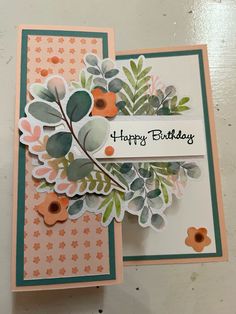 two cards with flowers and leaves on them, one has a happy birthday card in the middle