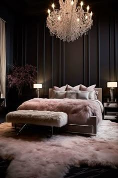 a luxurious bedroom with chandelier, fur rug and bed in the middle of it