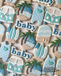 decorated cookies with the words baby and surfboards