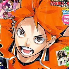 an anime magazine cover with the face of a young man in orange and black clothes