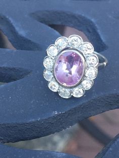 "One of the most beautiful rings I have seen!  I don't know what I love better; the unique pink-purple/lilac color; or these brilliant mixed European-cut diamonds that have so much sparkle! Made in the Belle Epoque fashion.  Mill grain details, lacy undercarriage.  Delicate yet strong enough for every day.  5.3 ctw of sapphires and diamonds! This 5.5 sized ring is made of 18 kt white gold.  It will come with an appraisal from an outside agency.  I had it appraised in 2020.  The sapphire is 10.3m Most Beautiful Rings, Belle Epoque Fashion, Pink Engagement, Pink Engagement Ring, Beautiful Wedding Bands, Middleton Style, Kate Middleton Style, Purple Sapphire, Everyday Rings