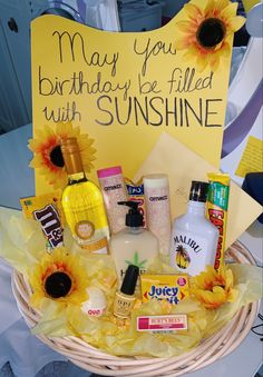 a birthday gift basket with sunflowers and personal care products for someone's special occasion