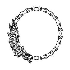 a black and white drawing of a circular frame with flowers on the inside, surrounded by circles