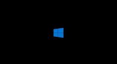 an image of a window in the dark with blue light coming from it's center